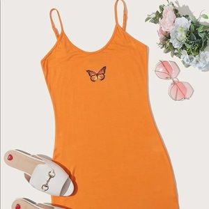 orange dress with butterfly detail
